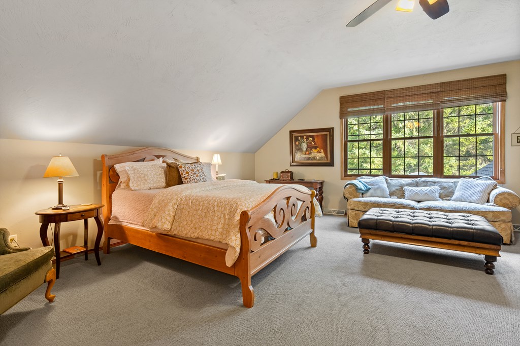 Oversized guest bedroom with sitting area