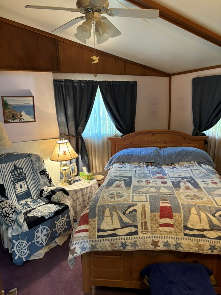 Main bedroom with vaulted ceiling