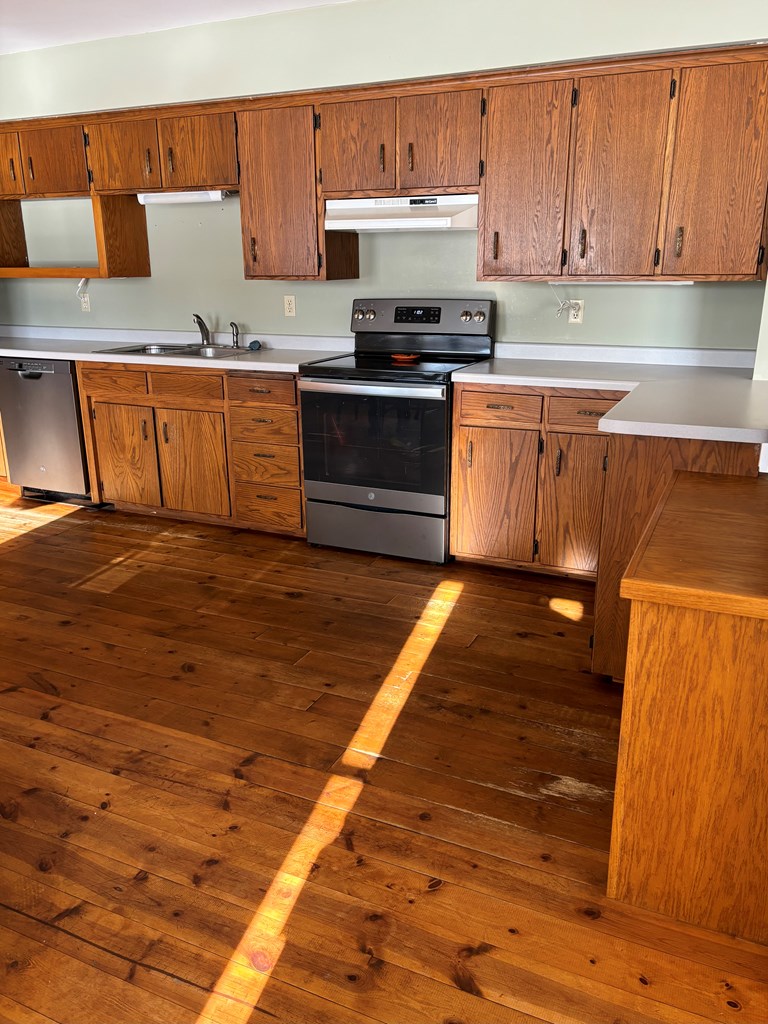 Wood floors throughout the main living area