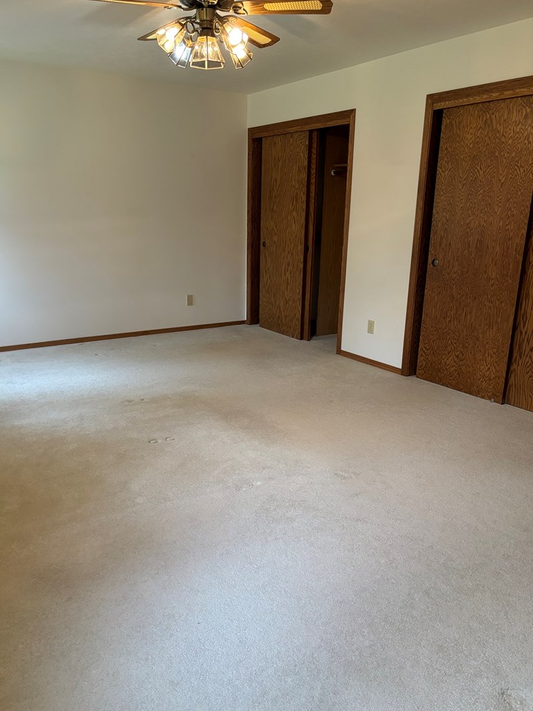 Large primary bedroom to back of home